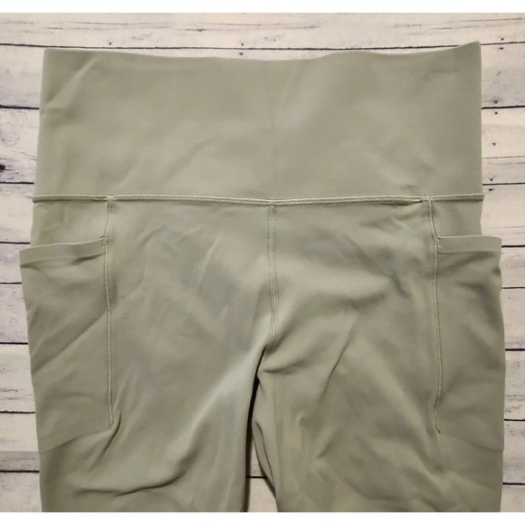 ATHLETA Stash Pocket Salutation 7/8 Tight Leggings Women Sz M Workout Yoga Pants - Picture 2 of 15